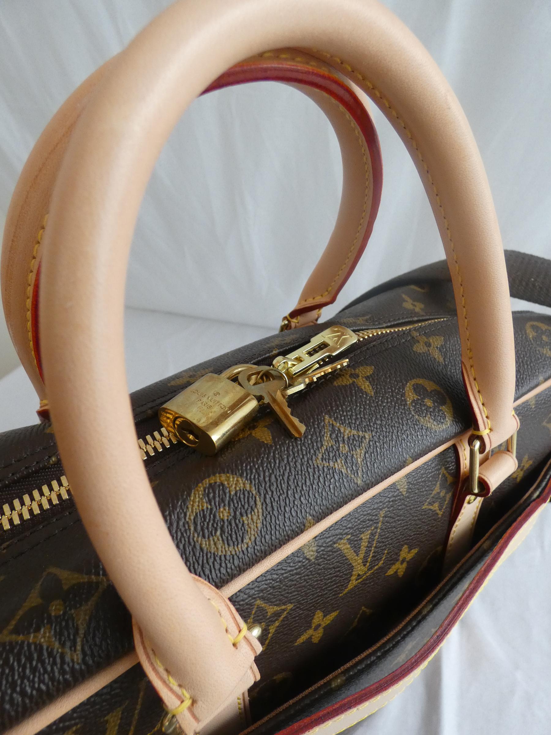 lot pr sac de voyage louis vuitton cadenas lien de